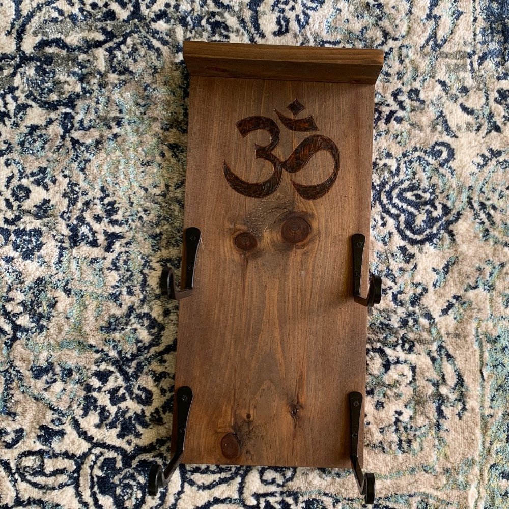 Om handmade yoga mat rack